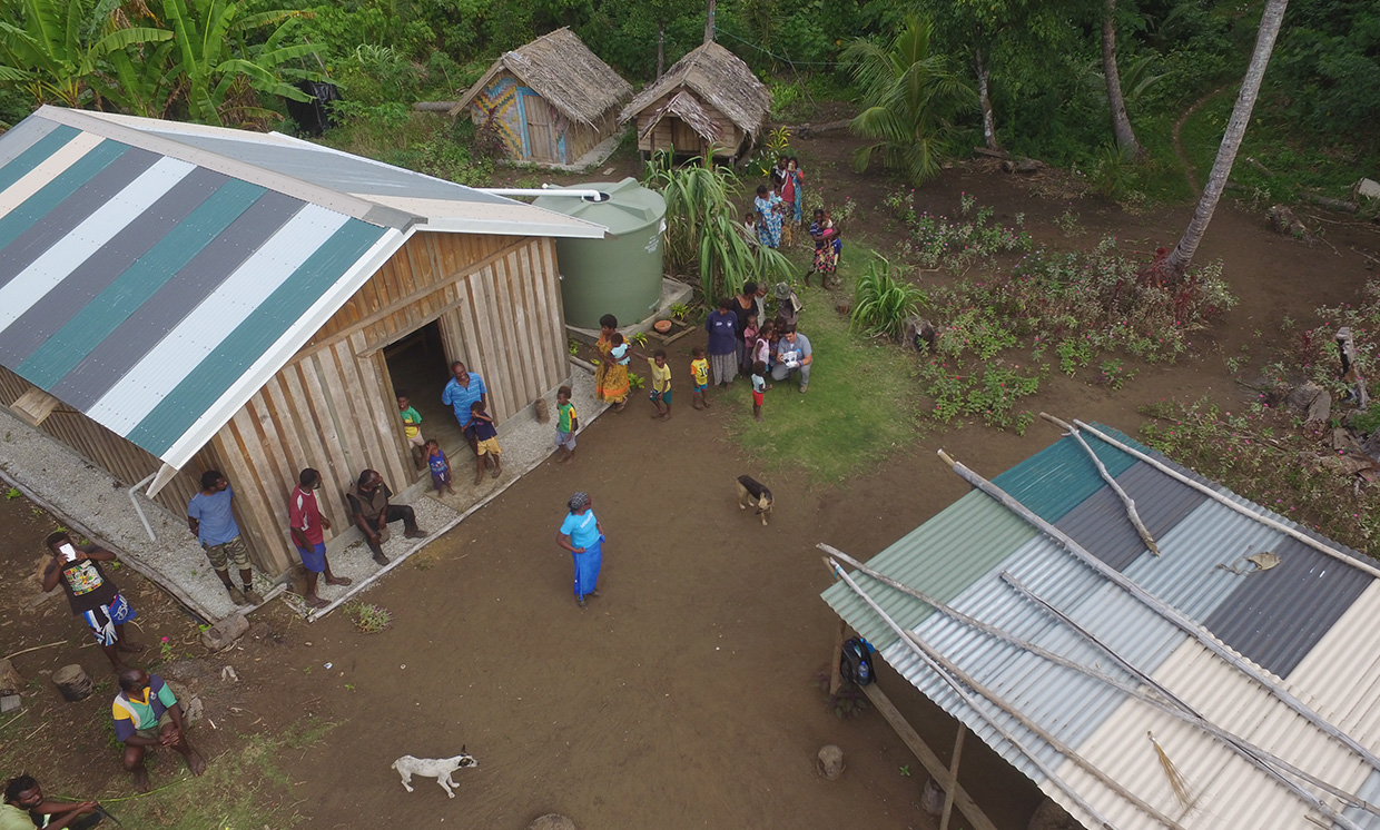 Drone aerial view of inhabitants of the South Pacific island nation of Vanuatu.