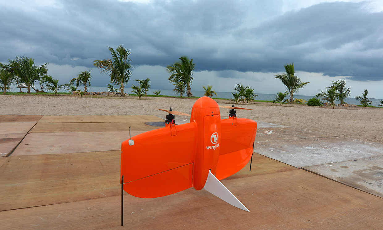 Wingtra’s bright orange drone ready to fly in all weather conditions.